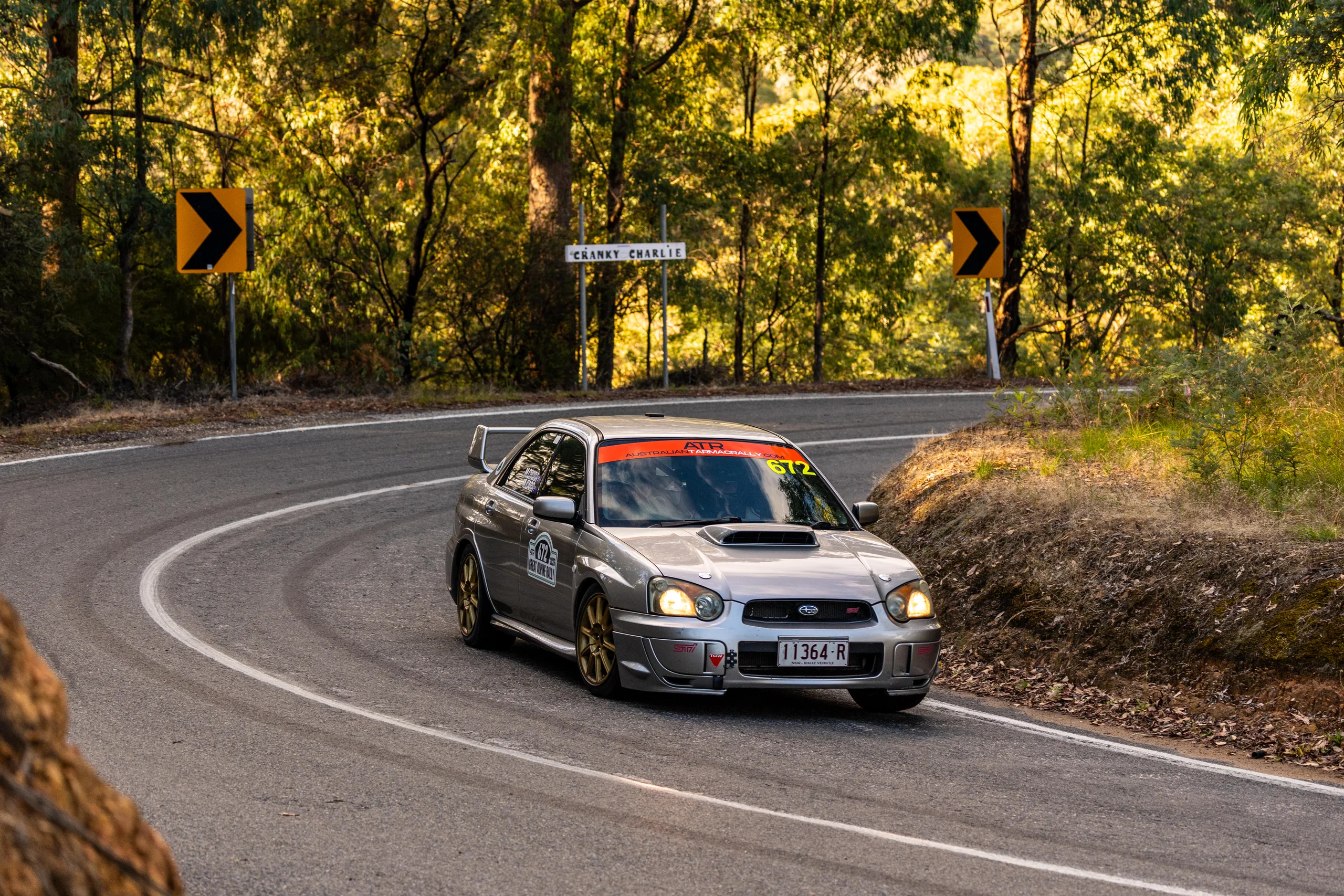 Shakewell Racing Subaru WRX STI cornering on an autumn tarmac mountain road at the Great Alpine Rally 2026